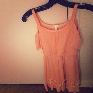 A dark peach romper dress